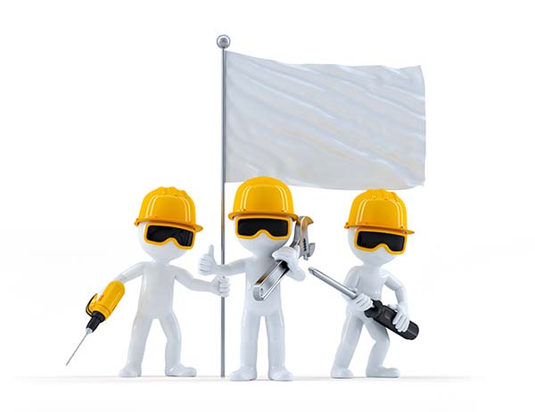 Group of construction workers with flag